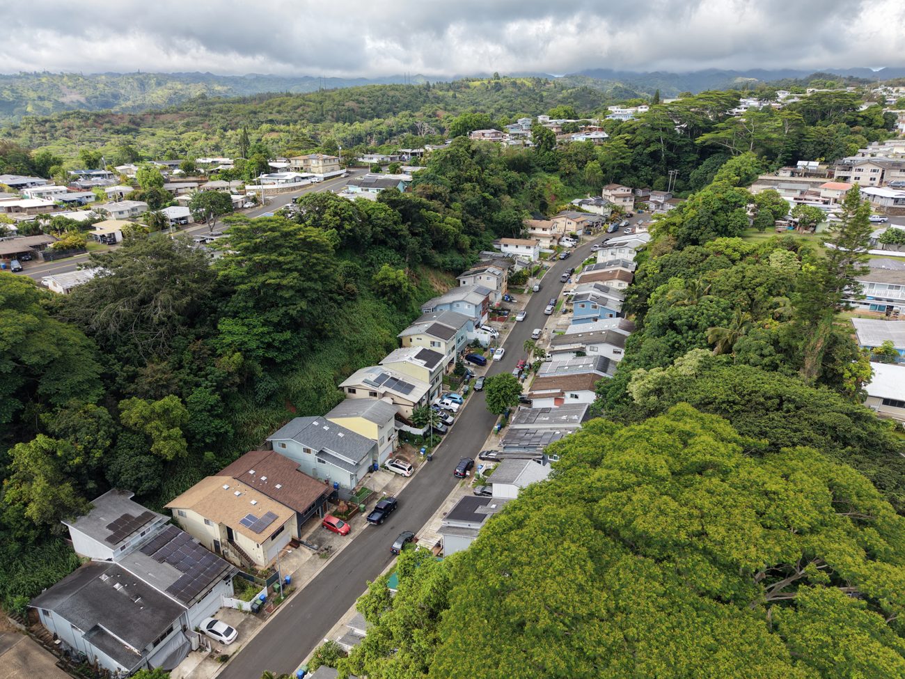 Aerial view of Oʻahu homes with rooftop solar showing roof azimuth and shade context
